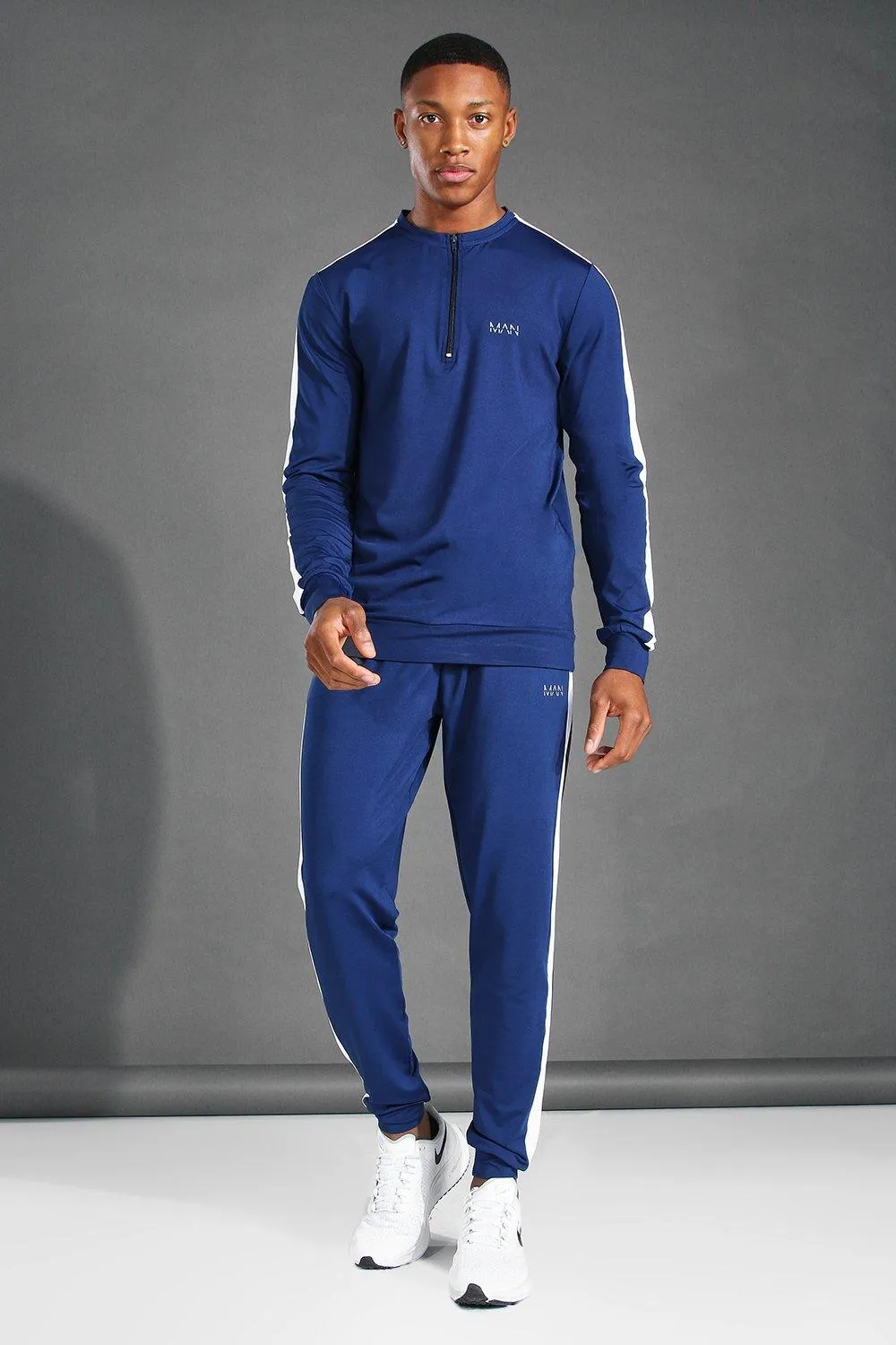 MAN Active Crew Neck 1/4 Zip Side Stripe Tracksuit | boohooMAN UK