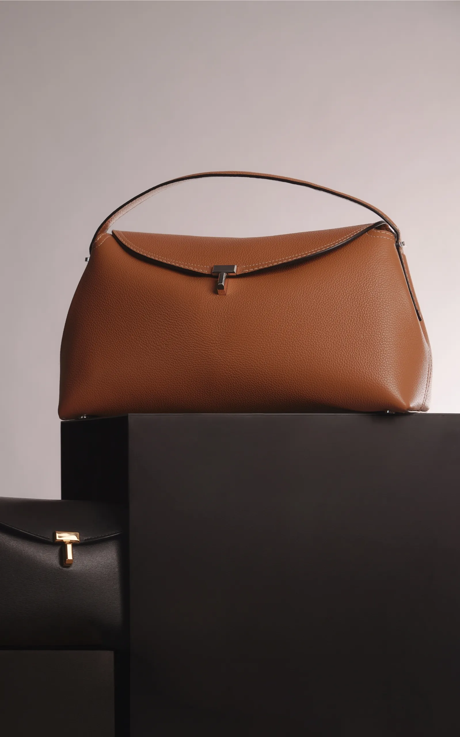 Toteme T-Lock Leather Top Handle Bag